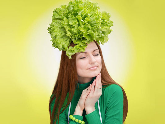 A Kitchen Garden You’ll Love All Year lady with lettuce on her head